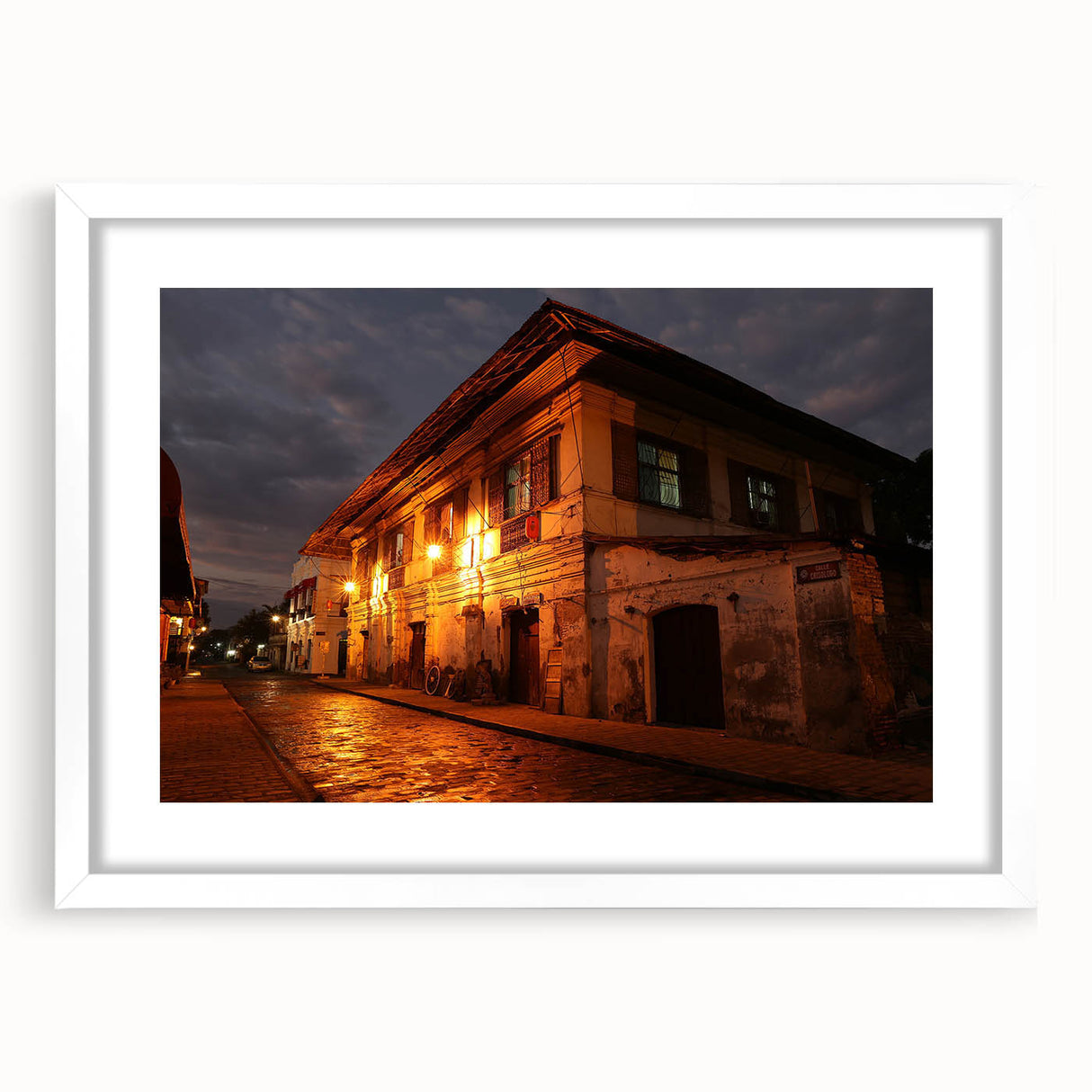 Abstract art print of a Philippine landscape in muted earth tones on a framed white canvas, suitable for dining room decor.