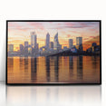 Large abstract wall art depicting a stylized Perth skyline in muted earth tones, framed in black acrylic.