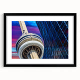 Extra large abstract art print depicting vibrant, colorful scenery of Ontario, framed in black with a mat.