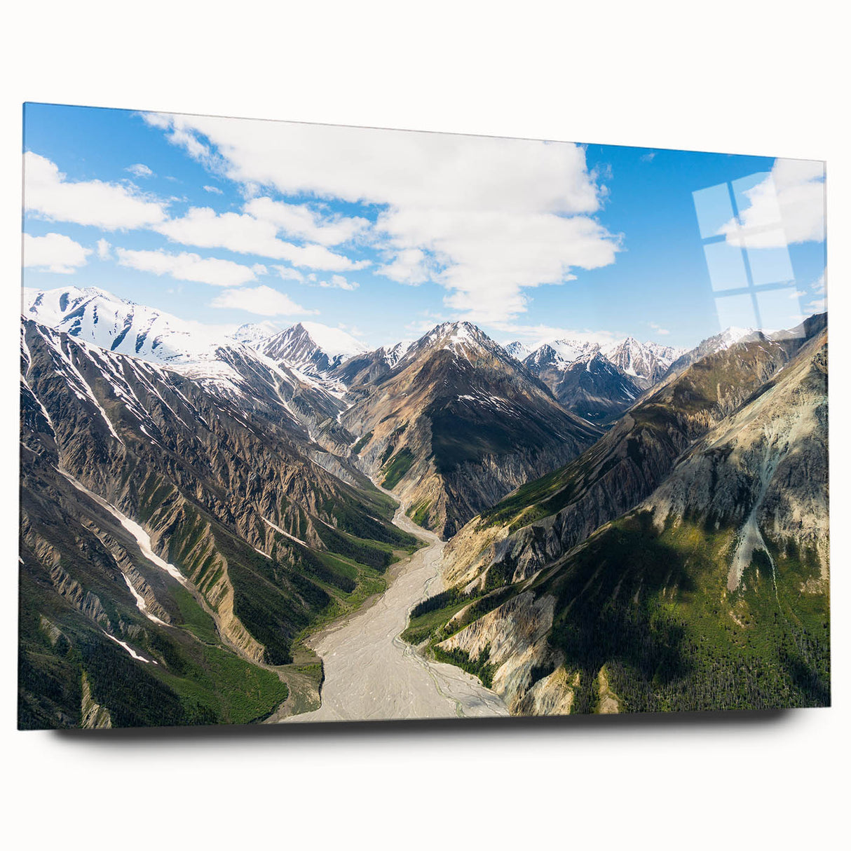 Large abstract wall art of Yukon scenery in muted green and blue tones on acrylic glass.