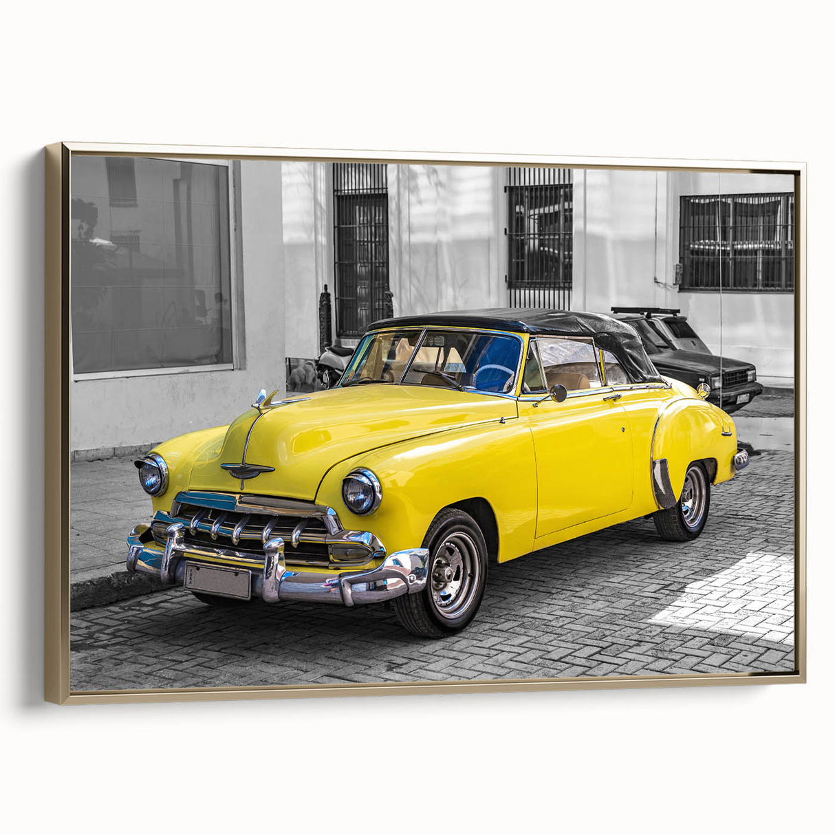 Framed canvas featuring a vintage-style Cuban landscape with lush greenery and a classic car.