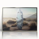 Art deco poster of a Caribbean beach scene in vibrant blues and greens, framed in silver acrylic.