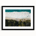 Colorful abstract art print of a Caribbean scenery in a large black frame, ideal for living room decor.