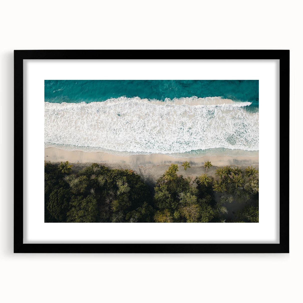 Colorful abstract art print of a Caribbean scenery in a large black frame, ideal for living room decor.