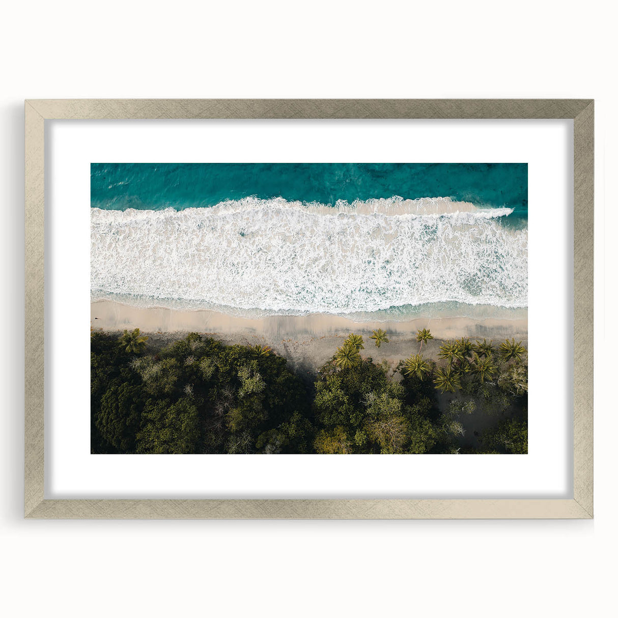 Abstract art print of Caribbean scenery in silver frame, featuring cool blue and green tones, suitable for dining room decor.