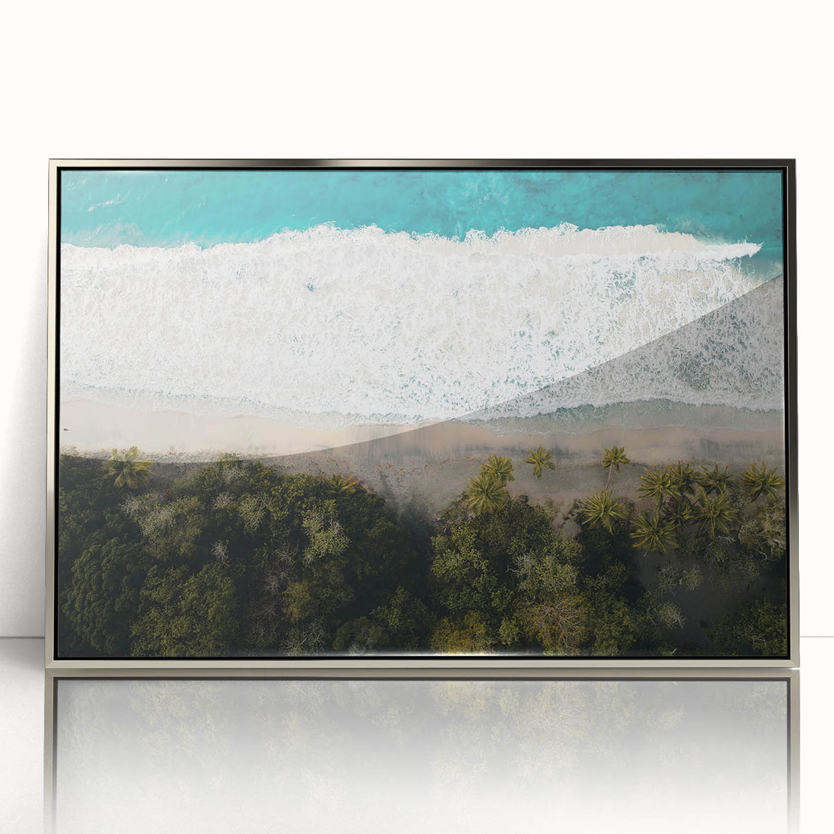 Art deco poster of a Caribbean Martinique scenery in muted blue and green tones, framed in silver acrylic.