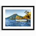 Abstract art print of Central American scenery in muted earth tones, framed with a black mat, suitable for dining room decor.
