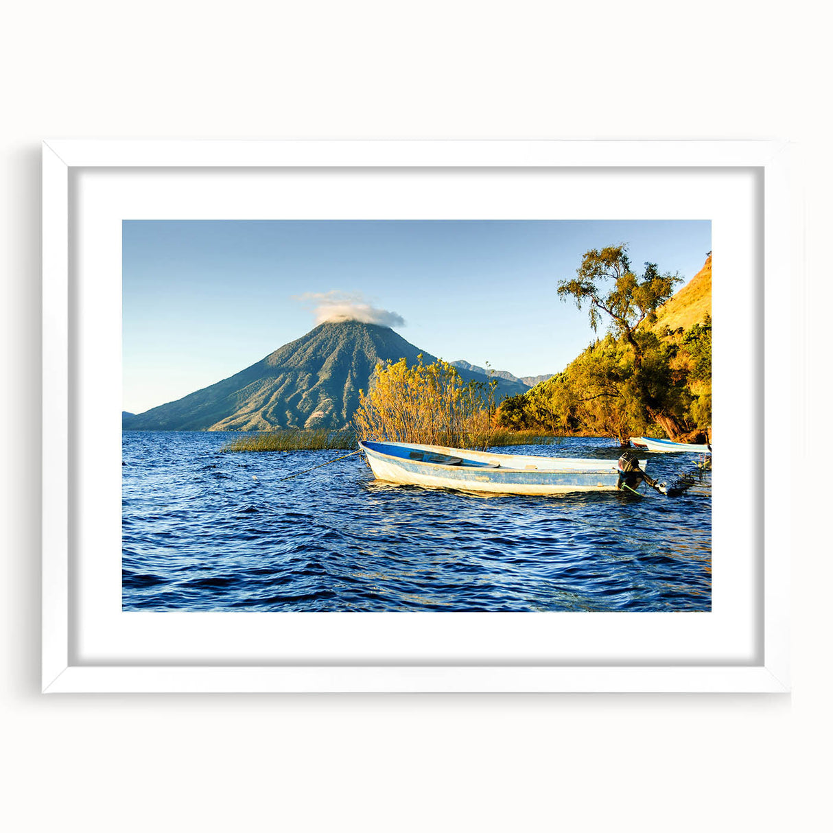 Extra large abstract art print of Central American scenery in muted earth tones, framed with a white mat.