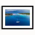 Abstract art print of Central American scenery in vibrant colors on a textured, extra large canvas, framed in black.