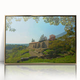 Art deco poster of an Albanian landscape, featuring gold and green tones on a framed acrylic.