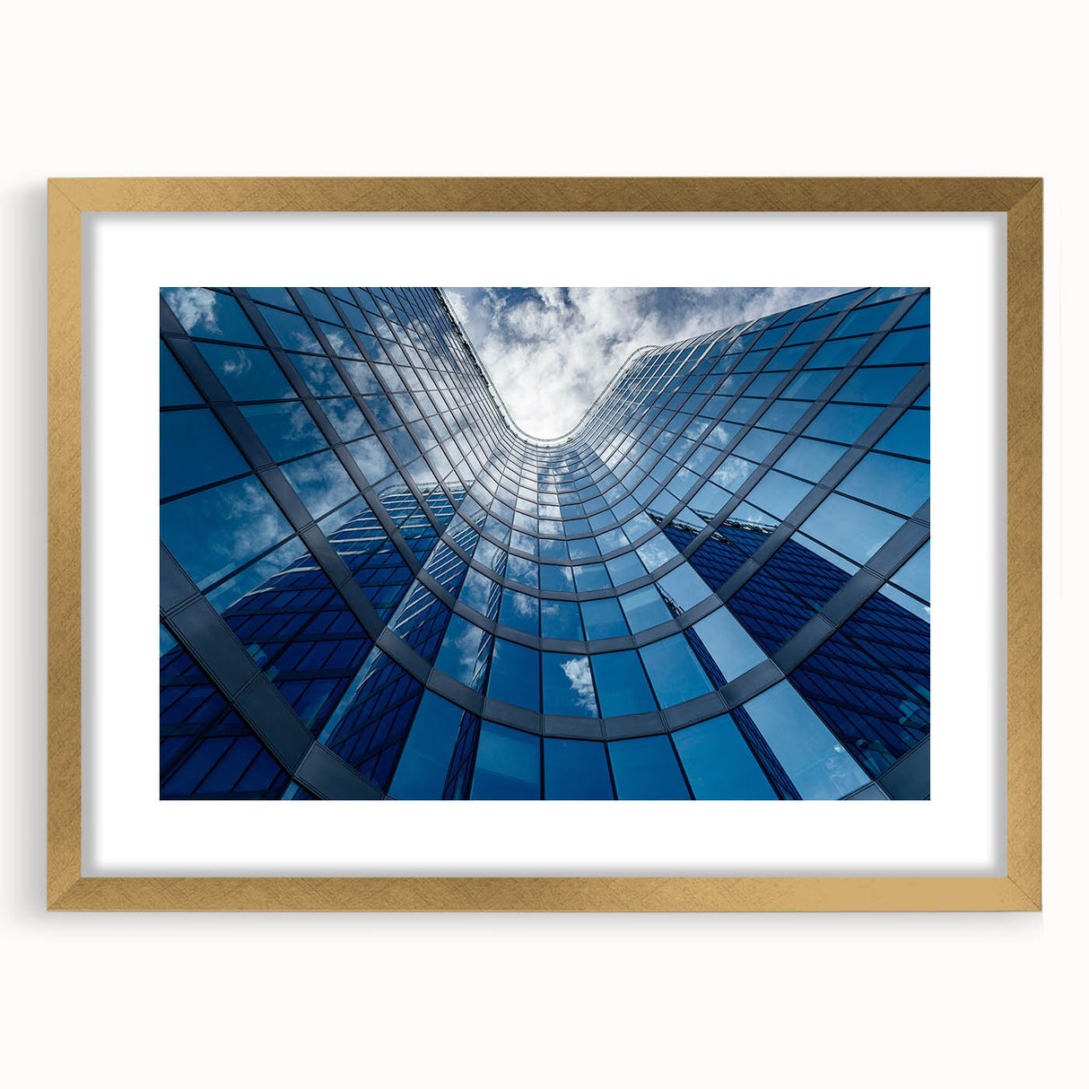 Abstract art print of Prague skyline in muted gold and blue tones on a framed canvas, ideal for dining room decor.