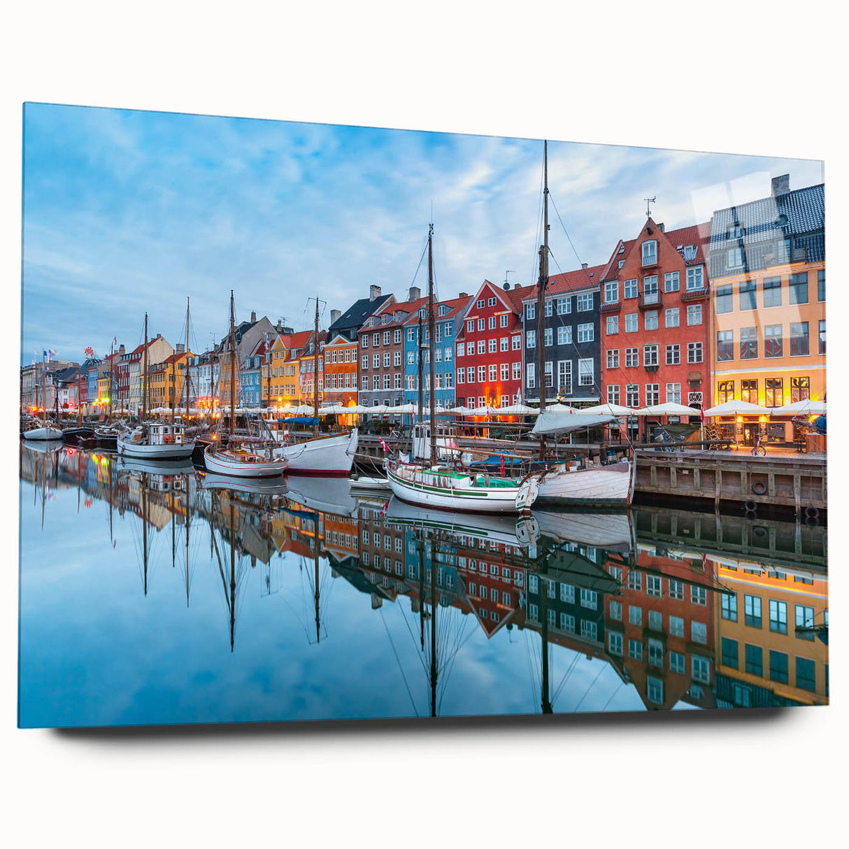 Large abstract depiction of a European cityscape in muted gray and blue tones on acrylic glass.