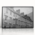 Large abstract wall art depicting a European scenery in Bath, England, with muted earth tones on a black framed acrylic.