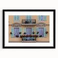 Extra large abstract art print of a colorful European scenery, textured finish, framed in black.