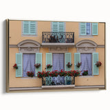 Framed canvas wall art featuring a vintage-style landscape painting of Nice, France in black and gold tones.