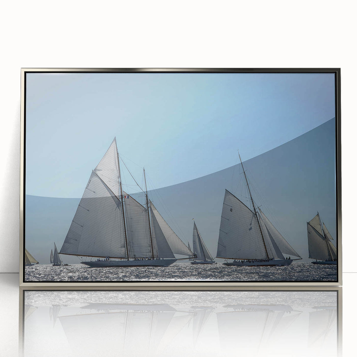 Large art print of a mid-century modernist European scenery in muted colors on a silver-framed acrylic.