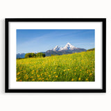 Extra large abstract art print of a colorful Bavarian landscape on textured canvas, framed in black.
