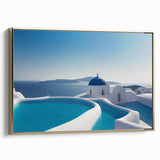 Framed canvas of Santorini landscape in muted blue and white tones, ideal for bedroom wall art.