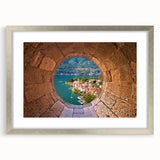 Extra large wall art depicting an abstract view of Lake Como in muted blue and silver tones, framed with a silver mat.