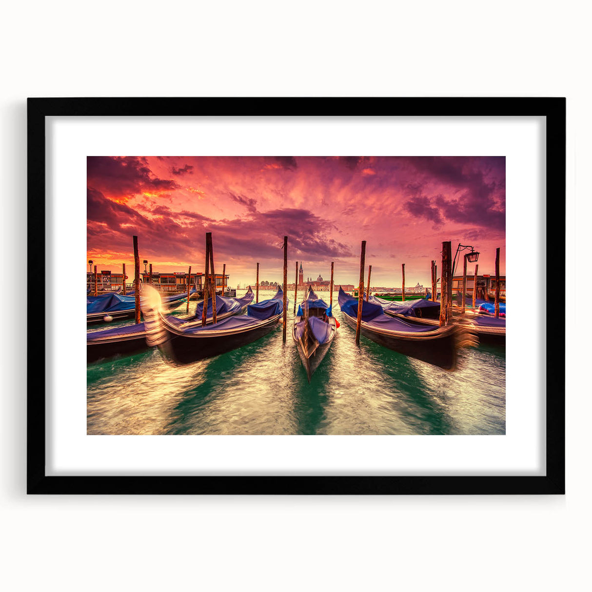 Colorful abstract art print of Venice scenery in vibrant hues on a large textured canvas, framed in black.
