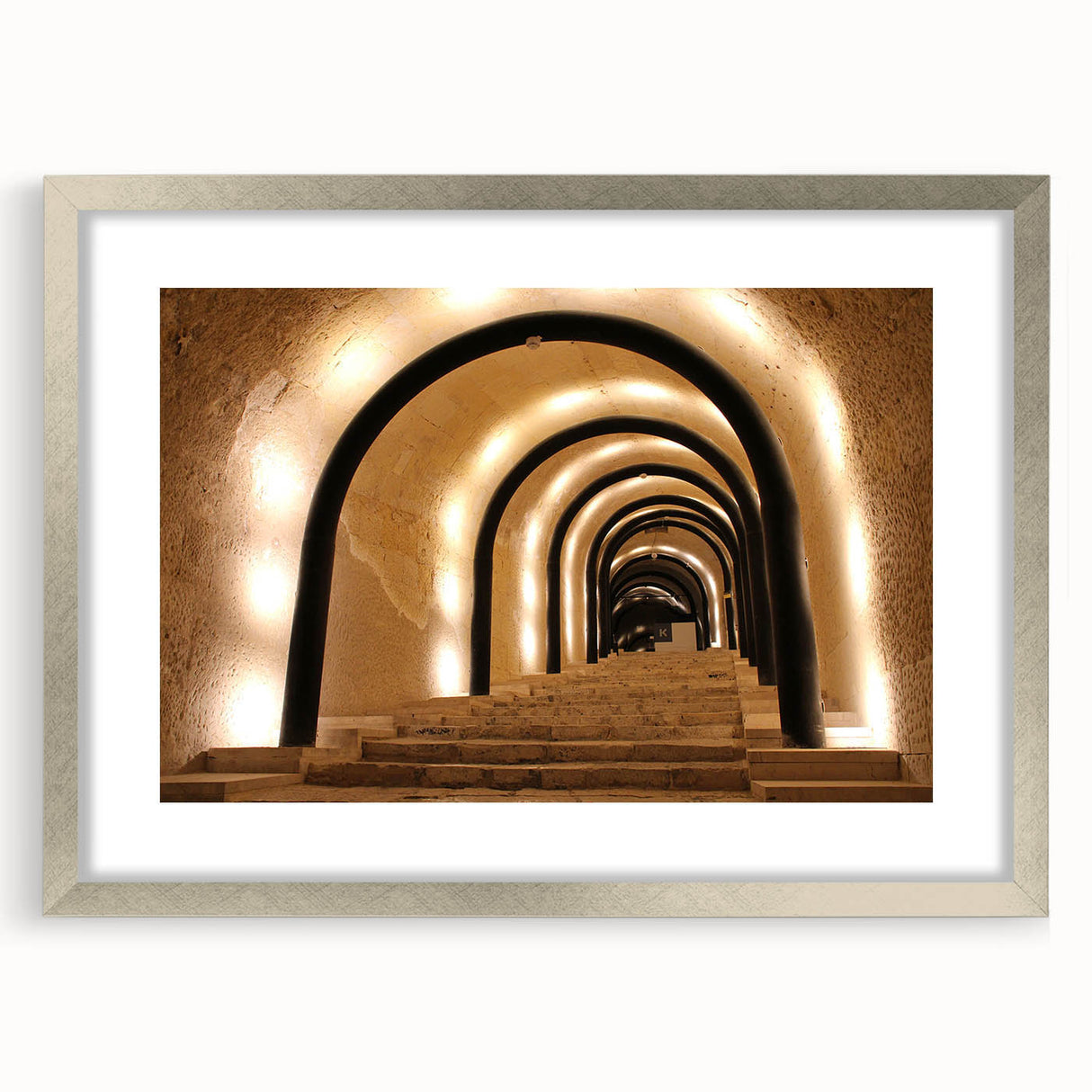 Extra large abstract art print of a European Malta scenery in muted blue and green tones, framed in silver.