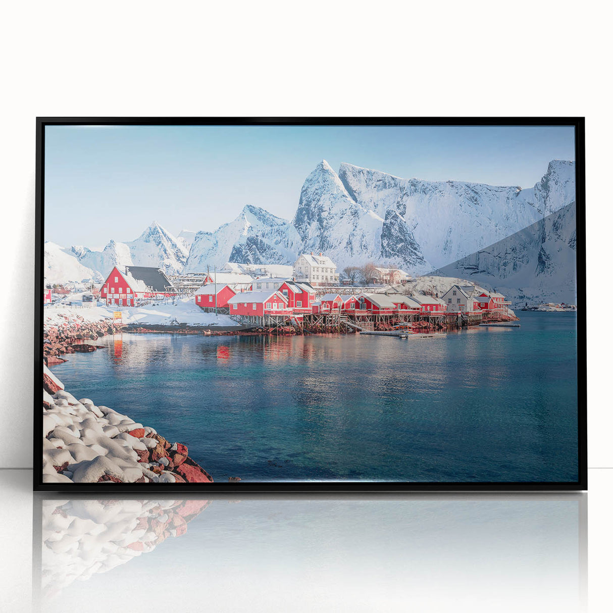 Large abstract wall art depicting a Scandinavian fjord in muted blue and green tones, framed in black acrylic.