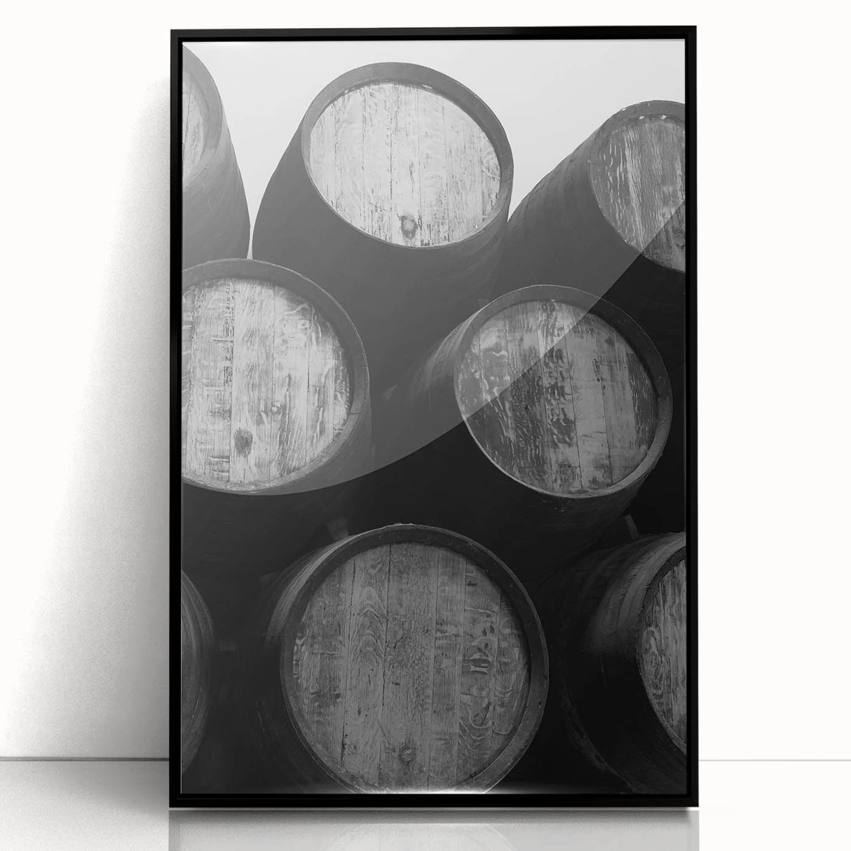 Large abstract wall art depicting Porto's riverfront in muted blue and gray tones on a black framed acrylic.