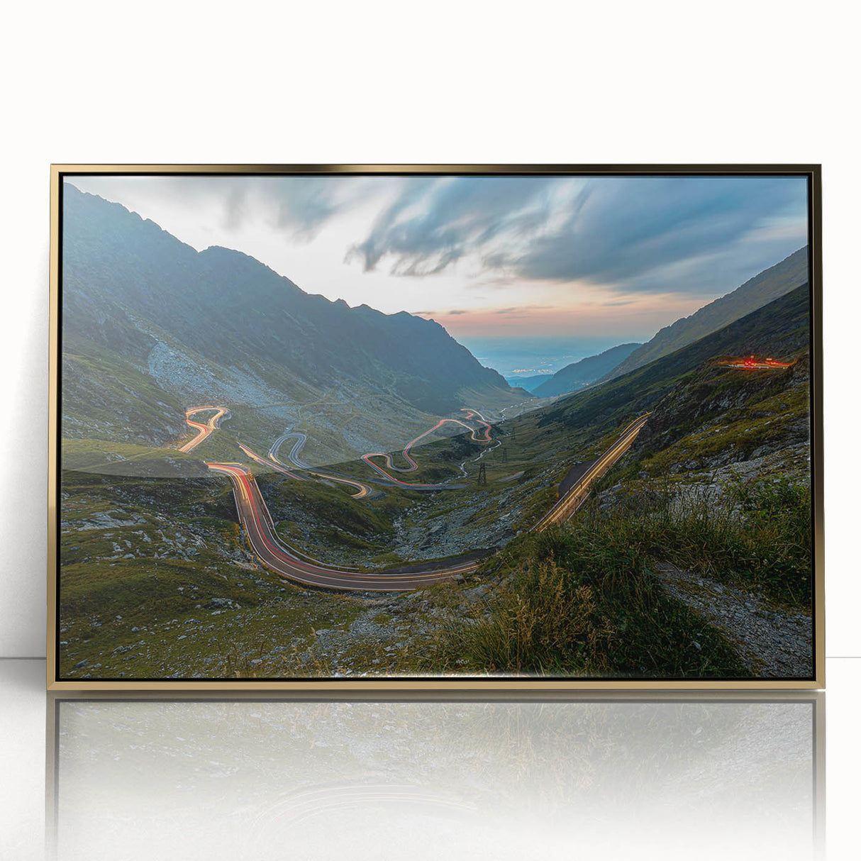 Art deco poster of a Romanian landscape in gold and green hues, acrylic framed.