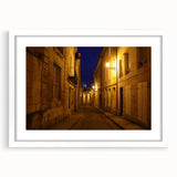 Abstract art print of Stockholm with muted gray and blue tones on a framed white mat, ideal for dining room decor.