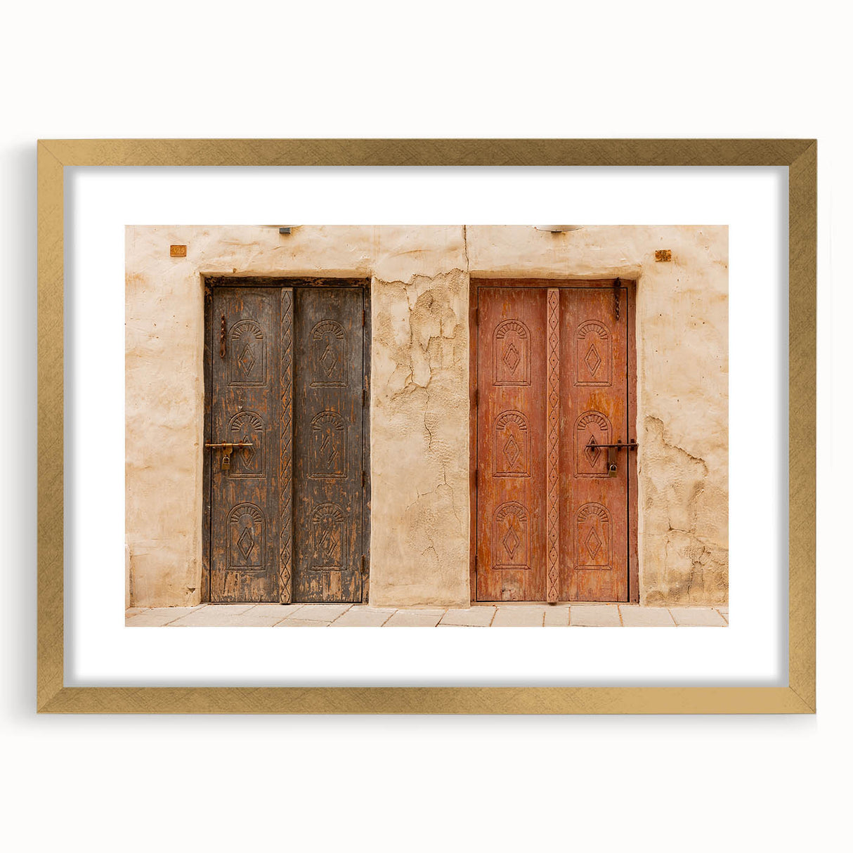 Extra large abstract art print of Dubai skyline in textured gold tones on a framed canvas, ideal for living room decor.