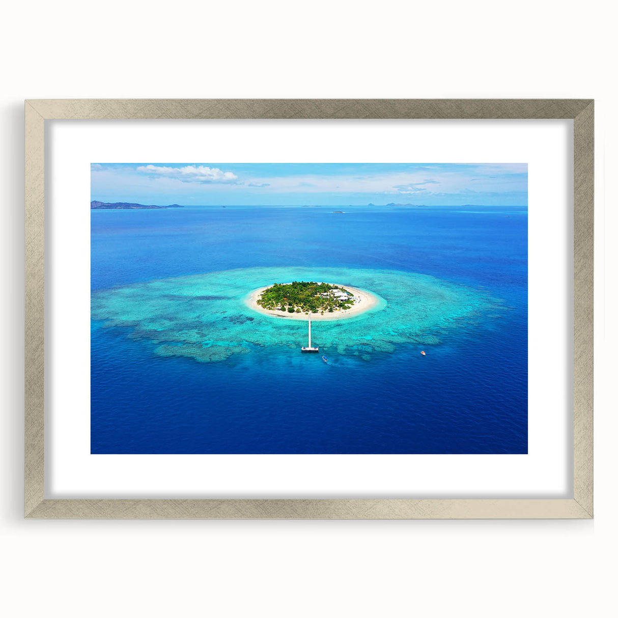 Textured abstract art print depicting an oceanic scene in cool blue and green tones, framed in silver, ideal for bedroom art.