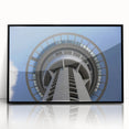 Large abstract wall art of Auckland skyline in muted gray and blue tones on a black framed acrylic.