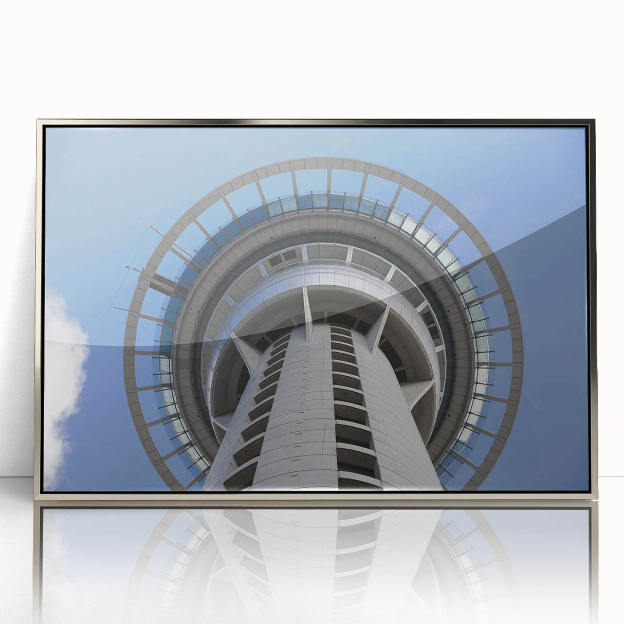 Mid-century modernist art of Auckland skyline in muted blue tones on a silver-framed acrylic print.