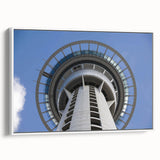 Vintage poster art of Auckland skyline in vibrant colors on extra large framed canvas, ideal for living room decor.