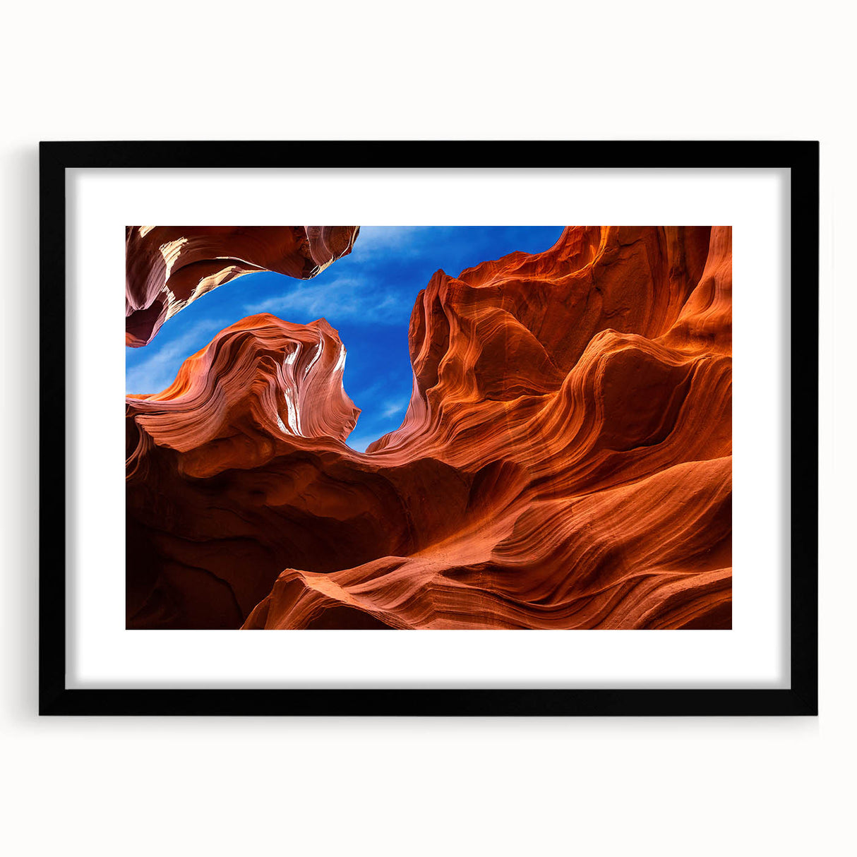 Extra large framed wall art of abstract, textured Antelope Canyon in vibrant red and orange tones.