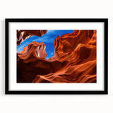 Extra large framed wall art of abstract, textured Antelope Canyon in vibrant red and orange tones.