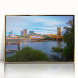 Mid-century modernist Sacramento skyline in gold and teal tones on a large framed acrylic print.