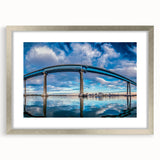 Textured abstract art print of San Diego scenery in silver frame, with cool gray and blue tones, suitable for bedroom decor.