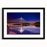 Extra large abstract art print depicting a colorful Kansas scenery on a textured canvas, framed in black.