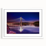 Abstract art print of Kansas scenery in muted earth tones, framed with a white mat, suitable for dining room decor.
