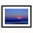 Colorful abstract art print of Acadia, Maine scenery in a black frame with mat.