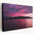 Scenic Maine coastline depicted on a large stretched canvas, featuring muted blues and grays, suitable for kitchen wall art.