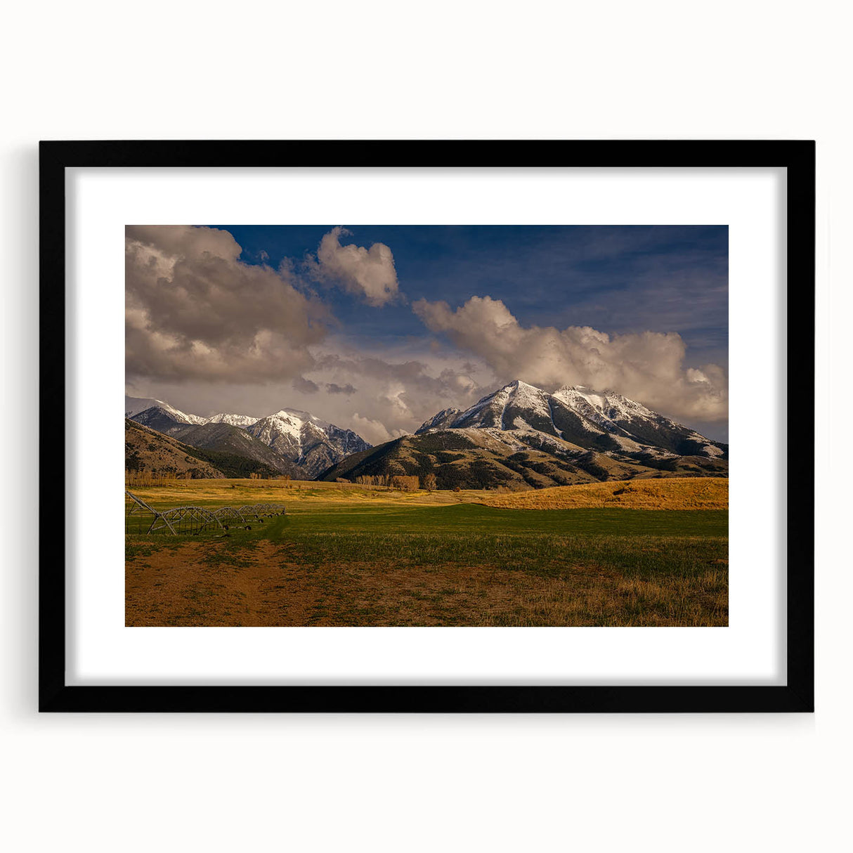Extra large abstract art print of colorful Montana scenery on textured canvas, framed in black.