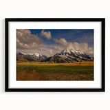 Extra large abstract art print of colorful Montana scenery on textured canvas, framed in black.