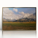 Mid-century modernist landscape of Montana scenery in gold and green tones on a framed acrylic print.