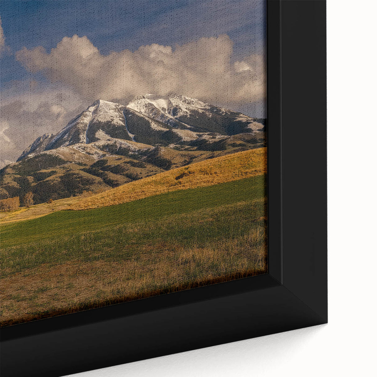 Textured black wall art featuring a vibrant Montana landscape on a framed canvas, ideal for living room decor.