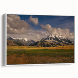 Vintage poster art of Montana scenery in vibrant colors on a large framed canvas, ideal for living room decor.