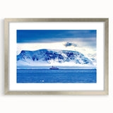 Textured abstract art print of Charlotte skyline in muted grays and blues, framed in silver, ideal for bedroom art.