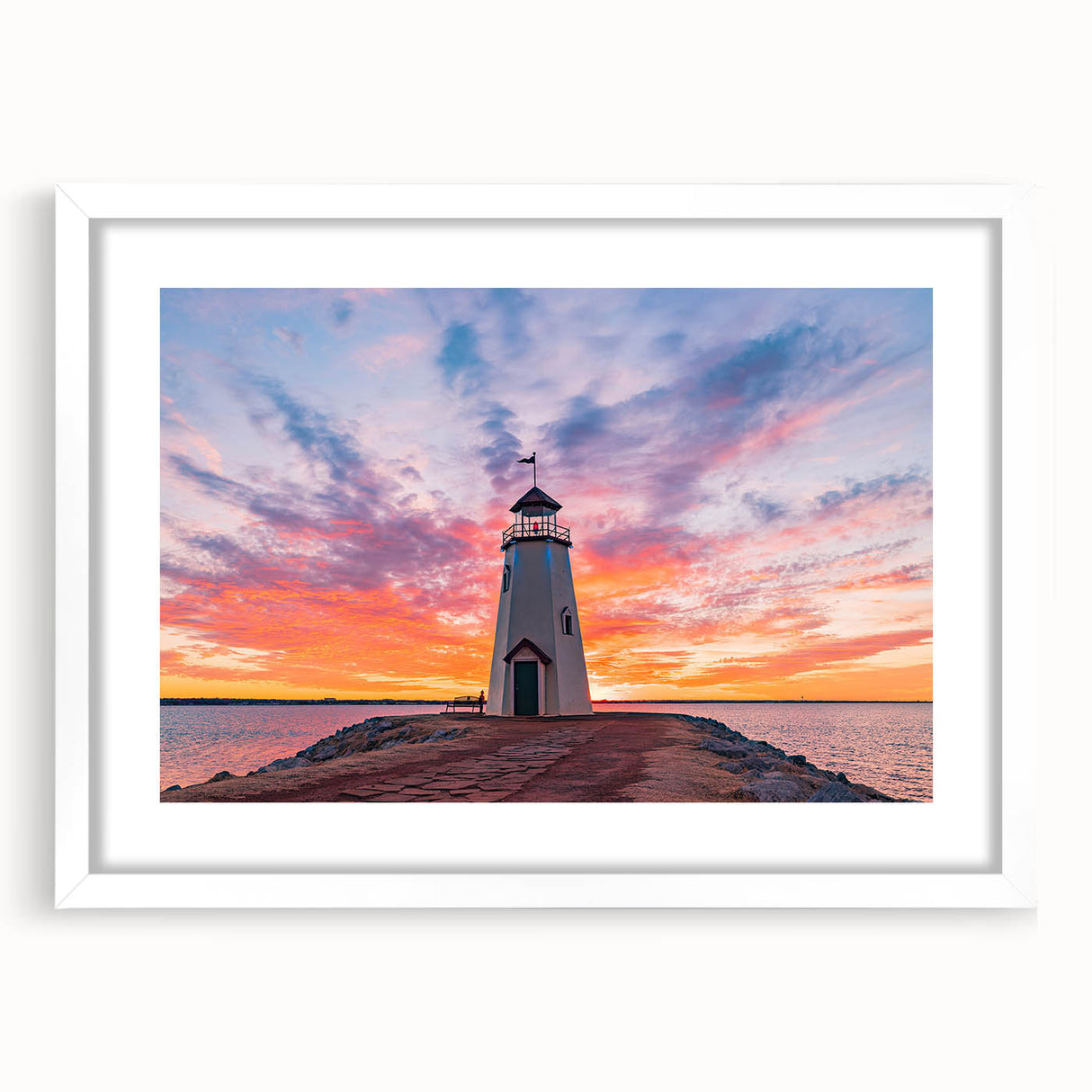 Abstract art print of Oklahoma scenery in muted earth tones on a white framed canvas.