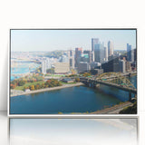 Acrylic print of Pittsburgh skyline in art deco style, featuring muted gray and blue tones, ideal for modern art wall decor.